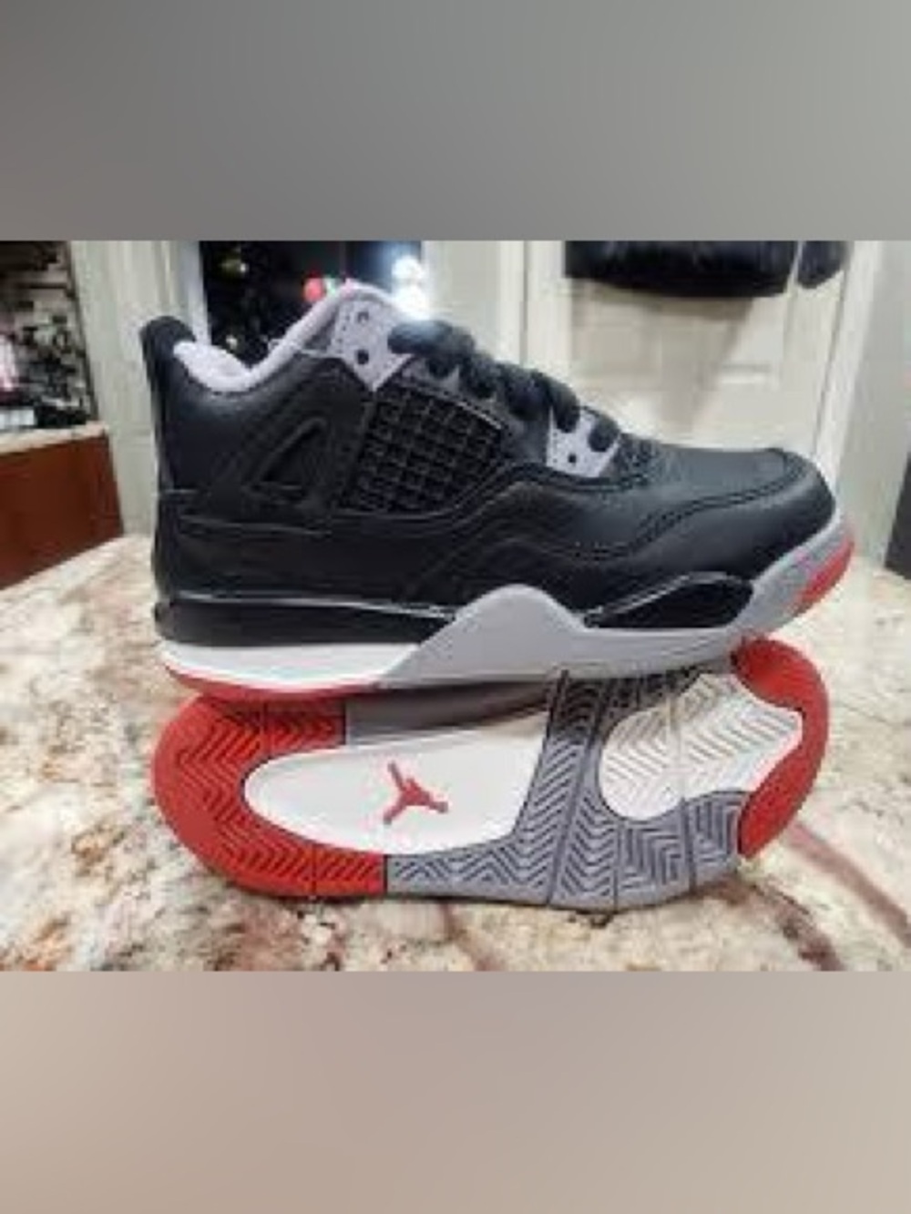 Jordan Kids Black and Grey Sneakers with Red Sole Accent
